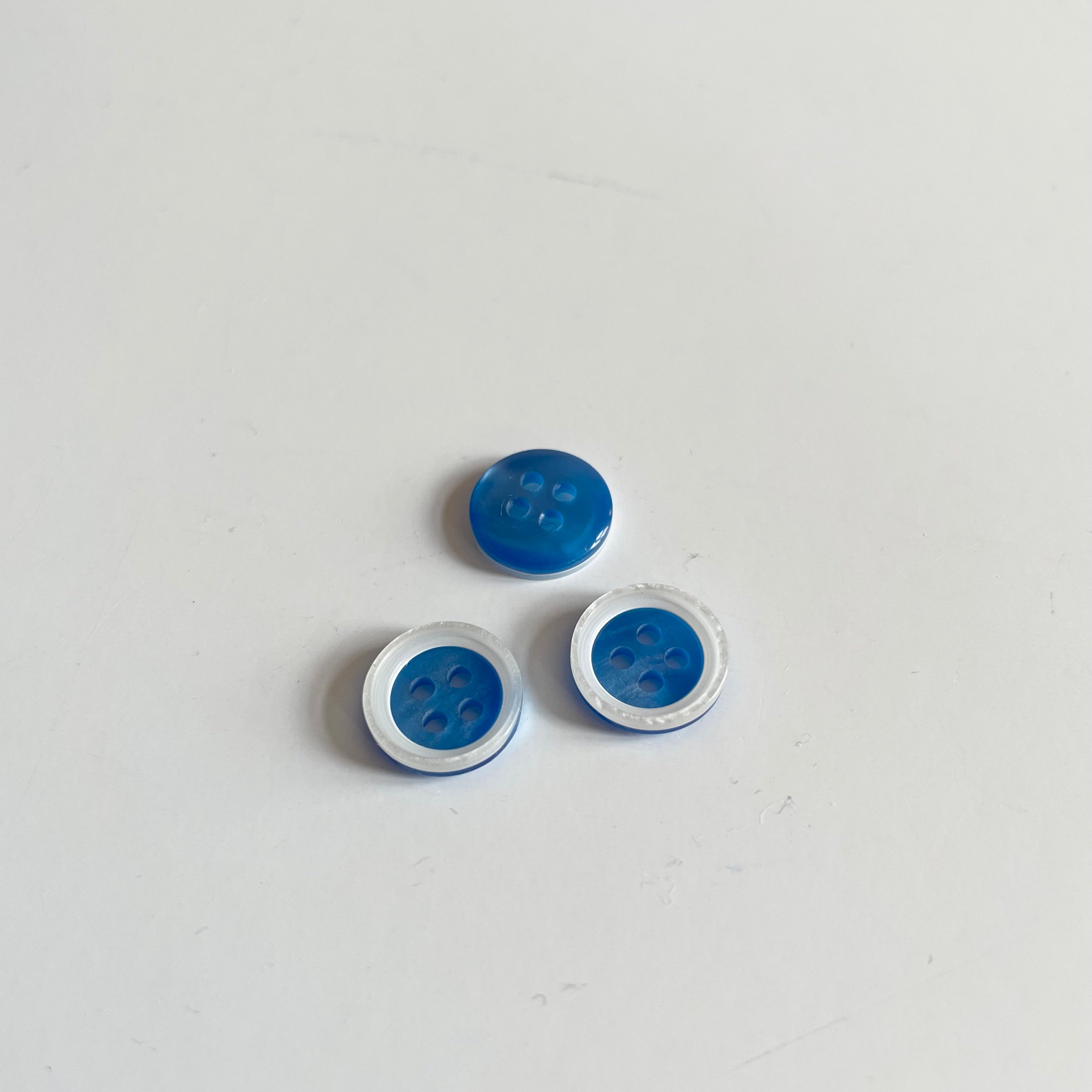 Plastic Shirt Button - White Rim on BluePlastic Shirt Button - White Rim on Blue