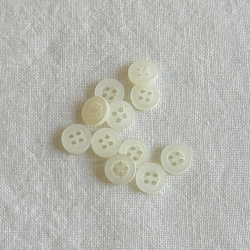 white four-hole shirt button