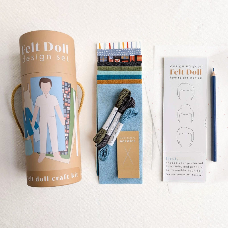 Felt doll craft kit with packaging, materials, and instructions on a white background