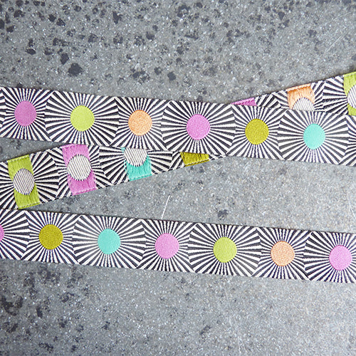 tula pink ribbon black starburst stripe multicolor polka dots