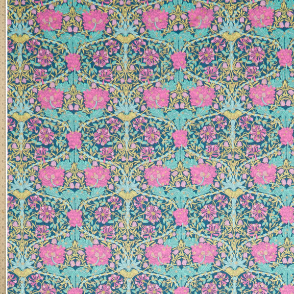 Floral fabric with pink and teal flowers on a blue background Liberty Fabric Christmas 2025 March Sparkle