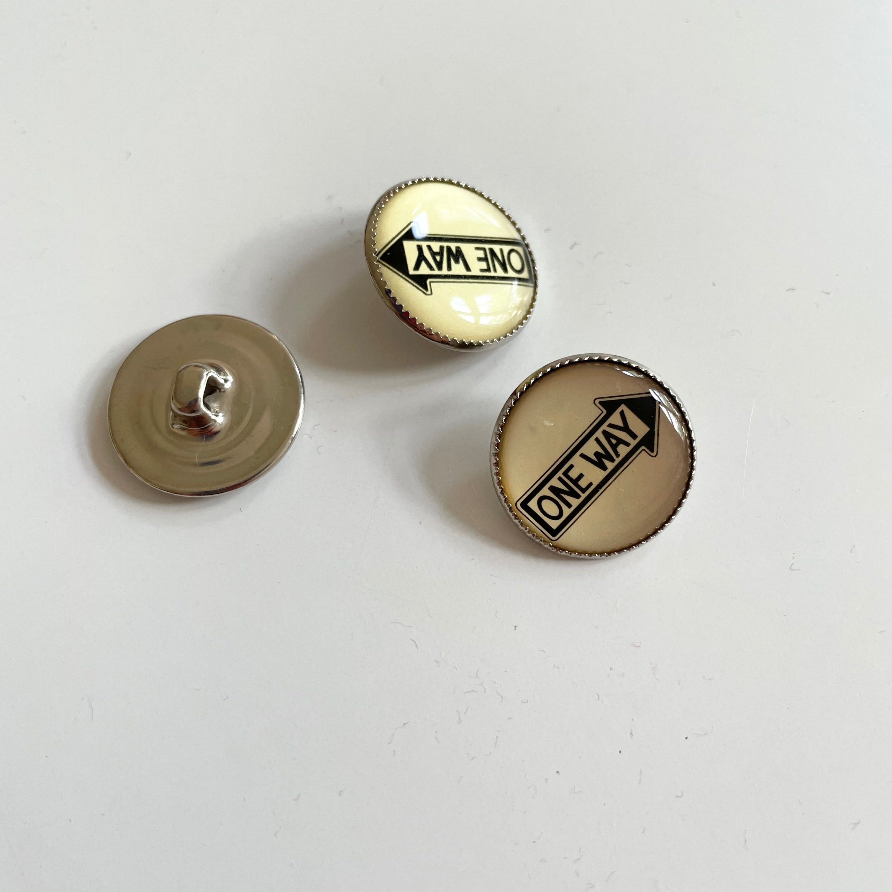 Enamelled One Way Sign Button