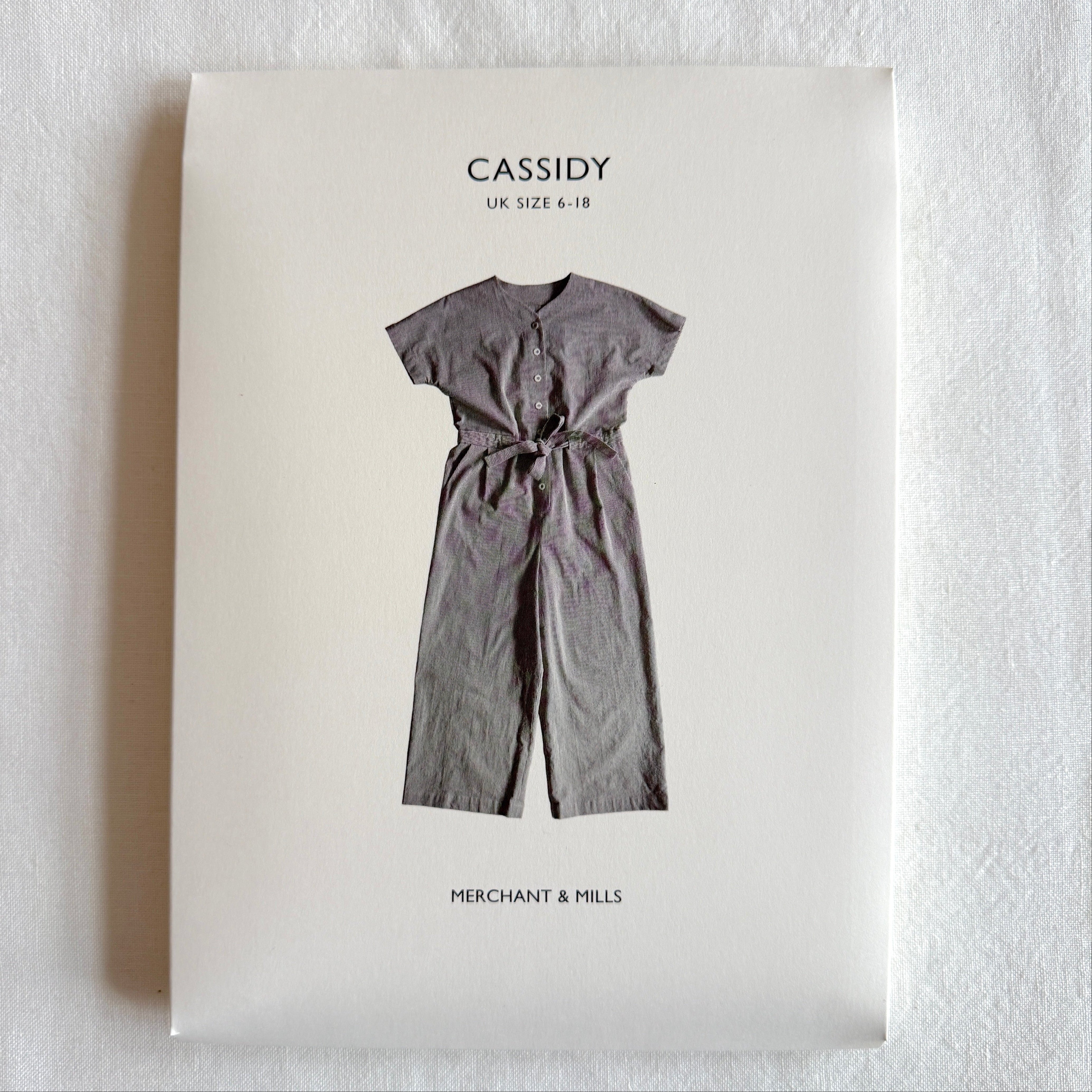 Package of Merchant & Mills Cassidy dress pattern on a light gray background