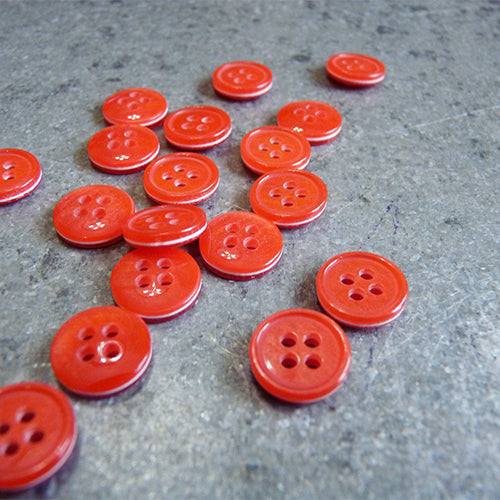 sandwiched 4 hole plastic button red white